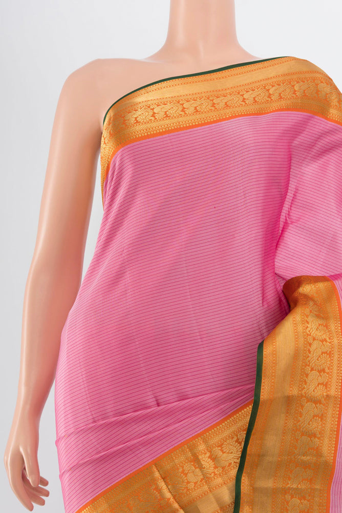Border image of Rose pink Kanchipuram Silk Saree with Zari Butta on the body and Silk Border. 