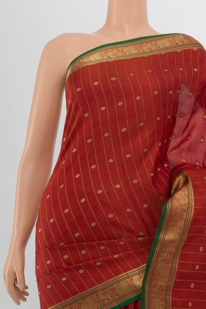 Border image of Maroon Kanchipuram Silk Saree with Zari Butta on the body and Silk Border. 