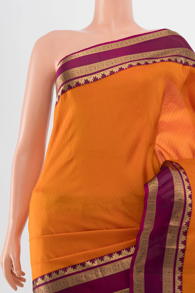Border image of Brick Orange Kanchipuram Silk Saree with Zari Butta on the body and Silk Border. 