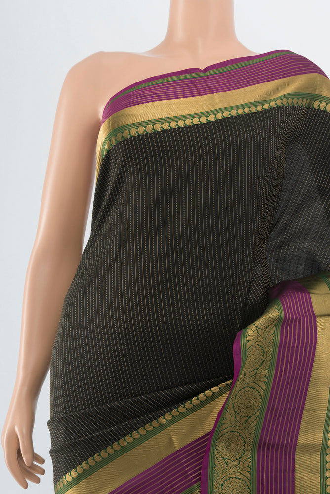 Border image of Black Kanjivaram Silk Saree with Zari Butta on the body and Silk Border. 