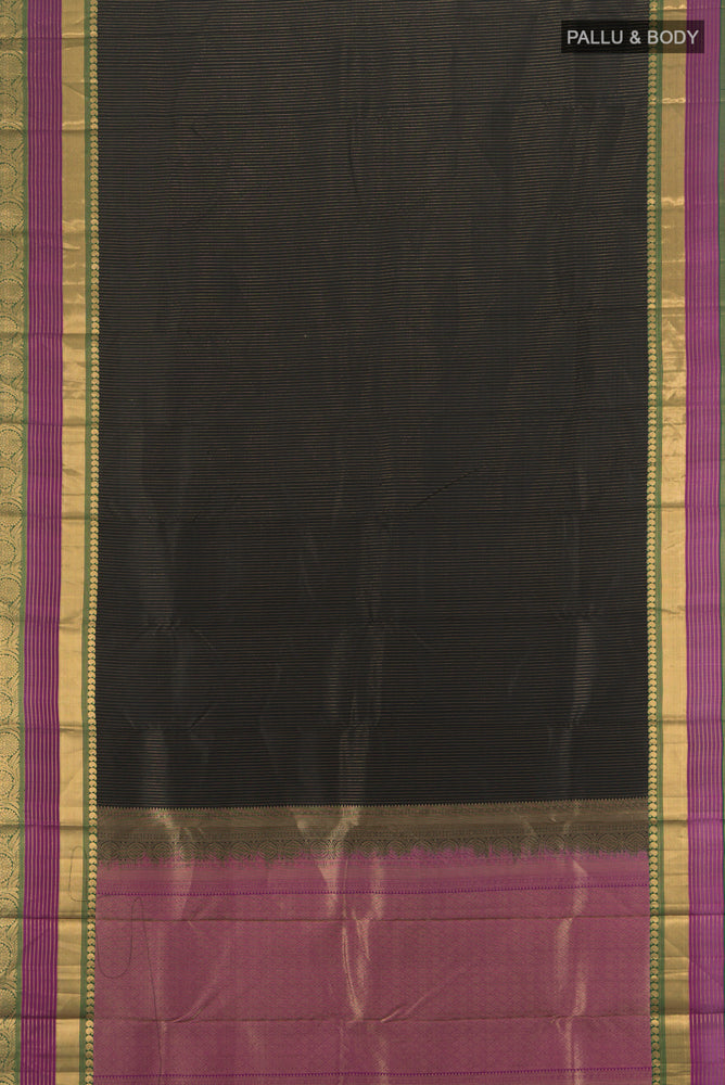 Flat view of Black Kanjivaram Silk Saree with Zari Butta on the body and Silk Border. 