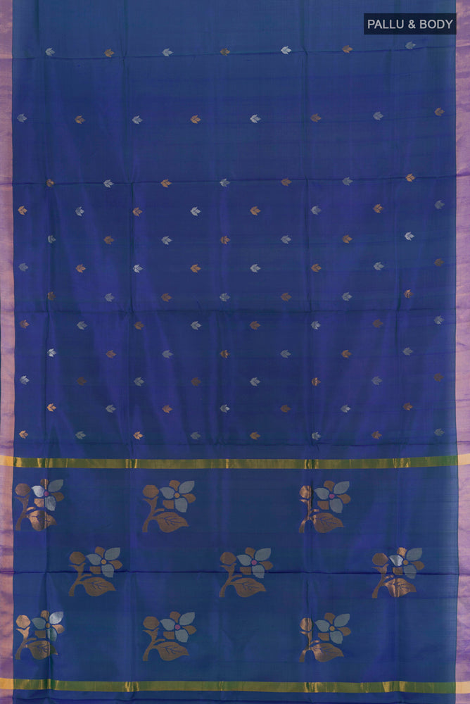 Flat view of Dark Blue Uppada Silk Saree with Zari Butta on the body and Silk Border. 