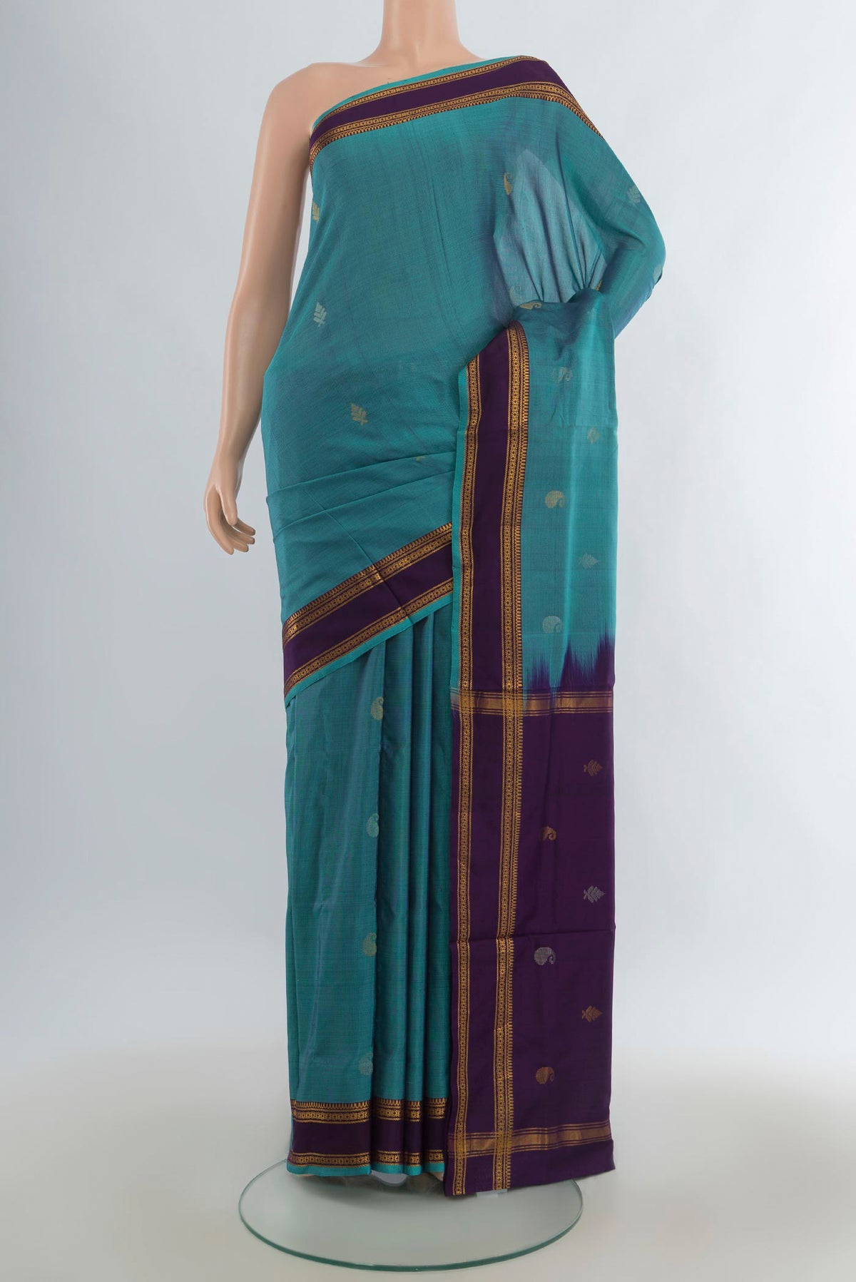 Pure Silk Light Blue Uppada Saree with Zari Butta on the body and Zari Border.  displayed on a mannequin