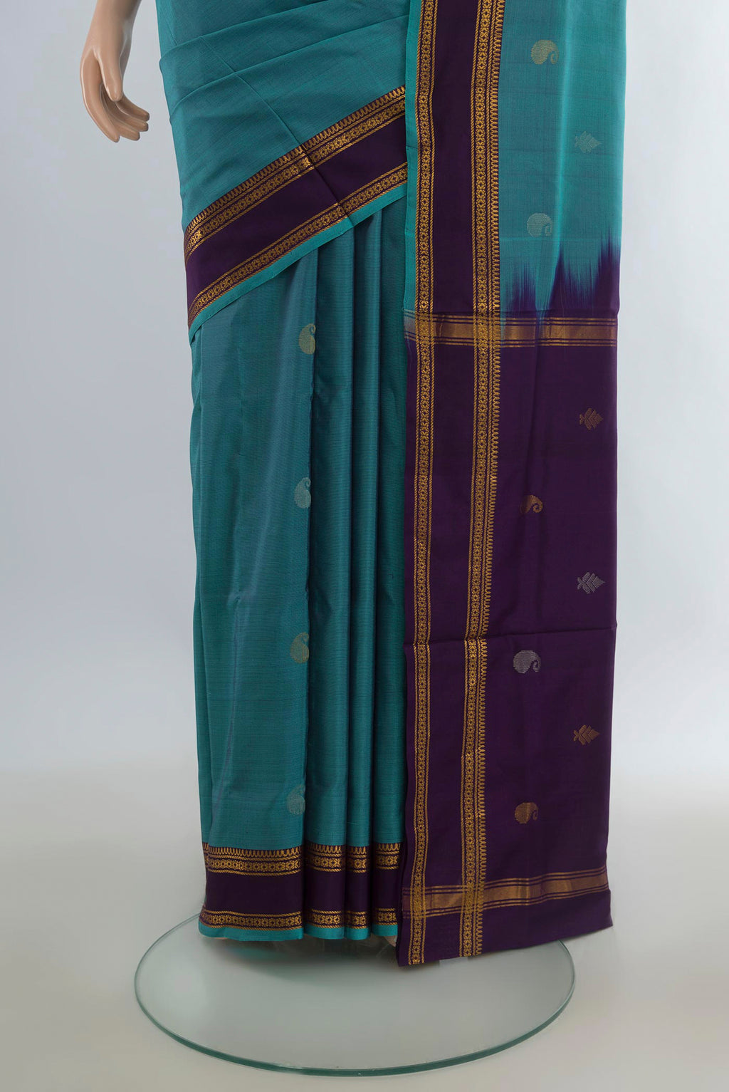 Pleats and pallu of Pure Silk Light Blue Uppada Saree with Zari Butta on the body and Zari Border. 