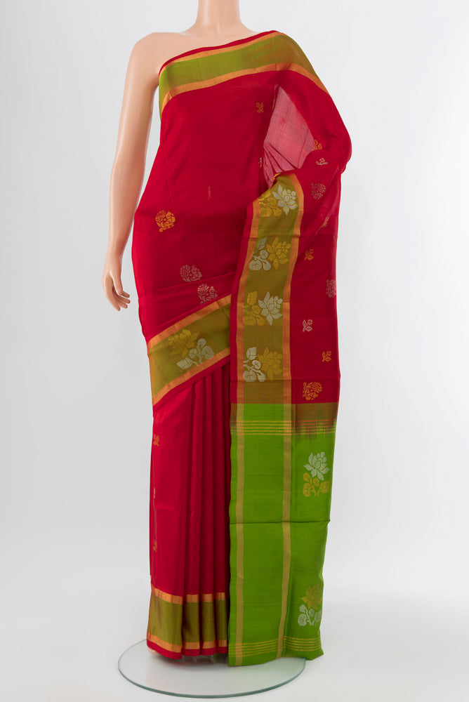 Red Uppada Silk Saree with Zari Butta on the body and Silk Border.  displayed on a mannequin