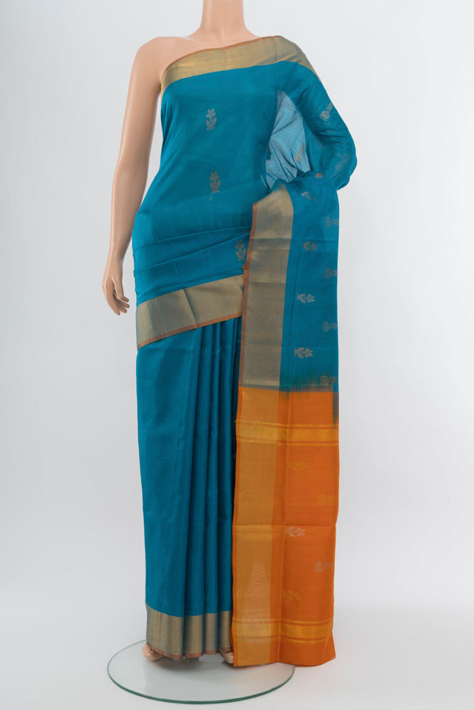 Dark Blue Uppada Silk Saree with Zari Butta on the body and Zari Border.  displayed on a mannequin