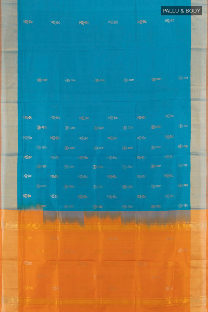 Flat view of Dark Blue Uppada Silk Saree with Zari Butta on the body and Zari Border. 