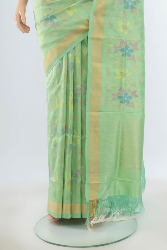 Pleats and pallu of Pure Silk Pure Zari Pista Green Uppada Saree with Zari Butta on the body and Silk Border. 
