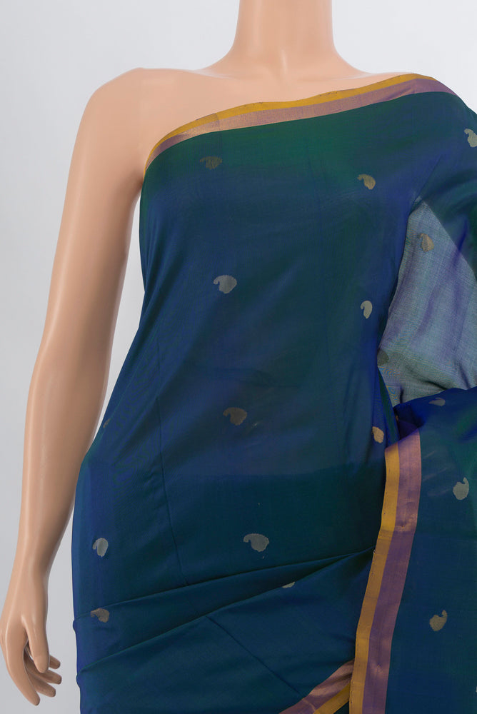 Border image of Peacock Blue Uppada Silk Saree with Zari Butta on the body and Silk Border. 