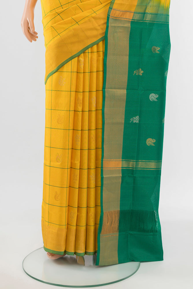 Pleats and pallu of Yellow Uppada Silk Saree with Zari Butta on the body and Silk Border. 