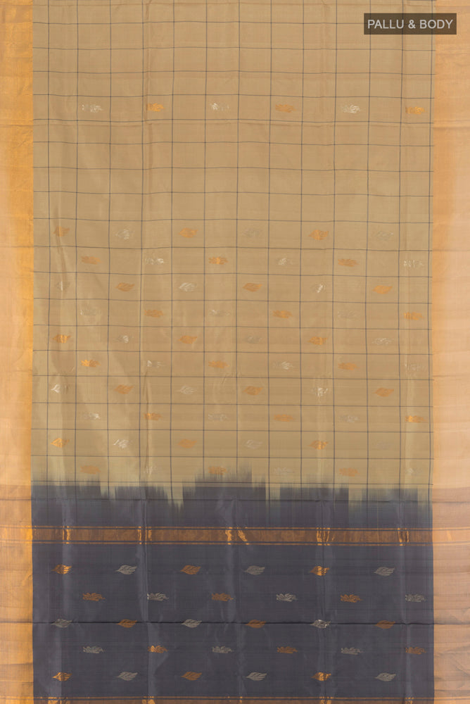 Flat view of Dark Beige Uppada Silk Saree with Zari Butta on the body and Silk Border. 