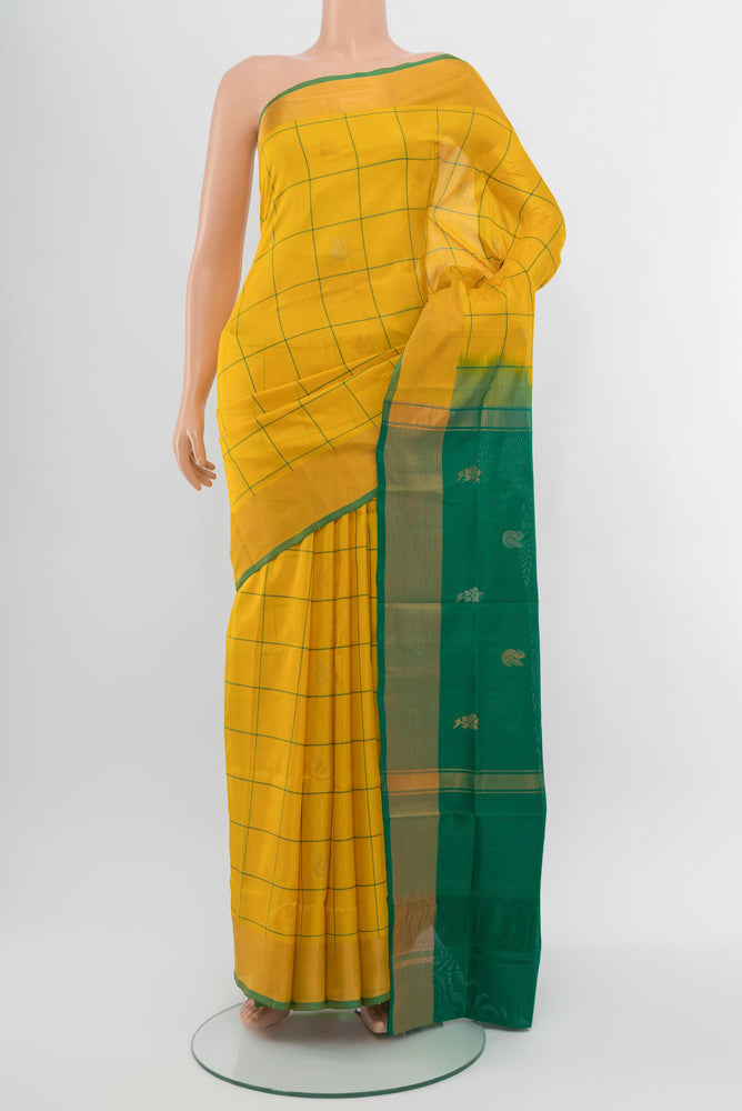 Yellow Uppada Silk Saree with Zari Butta on the body and Zari Border.  displayed on a mannequin