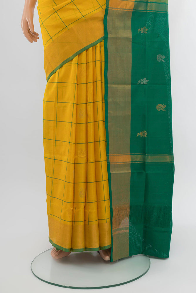 Pleats and pallu of Yellow Uppada Silk Saree with Zari Butta on the body and Zari Border. 