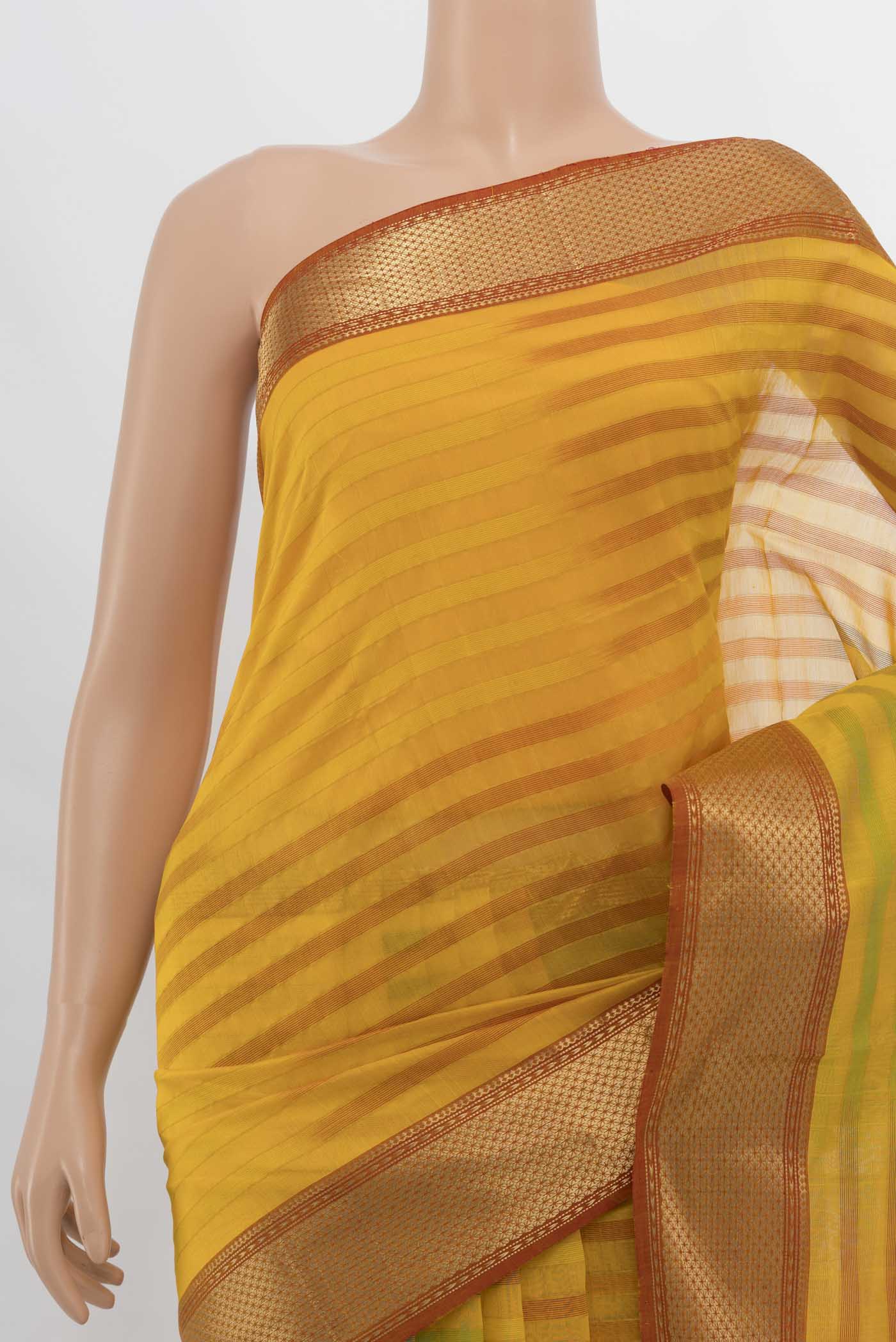 Border image of Yellow Maheshwari Silk Cotton Saree with Zari Butta on the body and Silk Border. 
