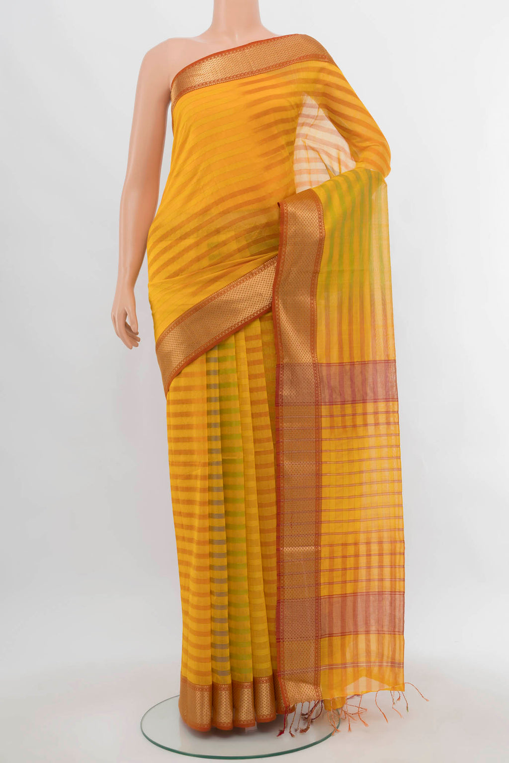 Yellow Maheshwari Silk Cotton Saree with Zari Butta on the body and Silk Border.  displayed on a mannequin
