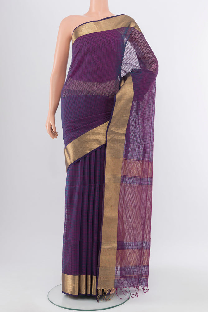 Purple Maheshwari Silk Cotton Saree with Zari Butta on the body and Silk Border.  displayed on a mannequin