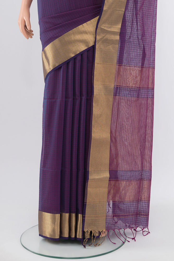 Pleats and pallu of Purple Maheshwari Silk Cotton Saree with Zari Butta on the body and Silk Border. 