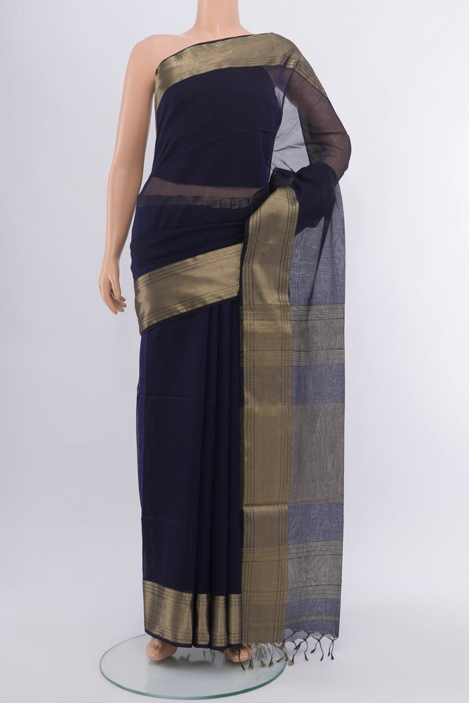 Navy Blue Maheshwari Silk Cotton Saree with Zari Butta on the body and Silk Border.  displayed on a mannequin