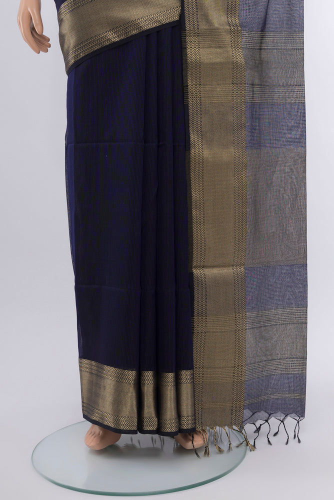 Pleats and pallu of Navy Blue Maheshwari Silk Cotton Saree with Zari Butta on the body and Silk Border. 