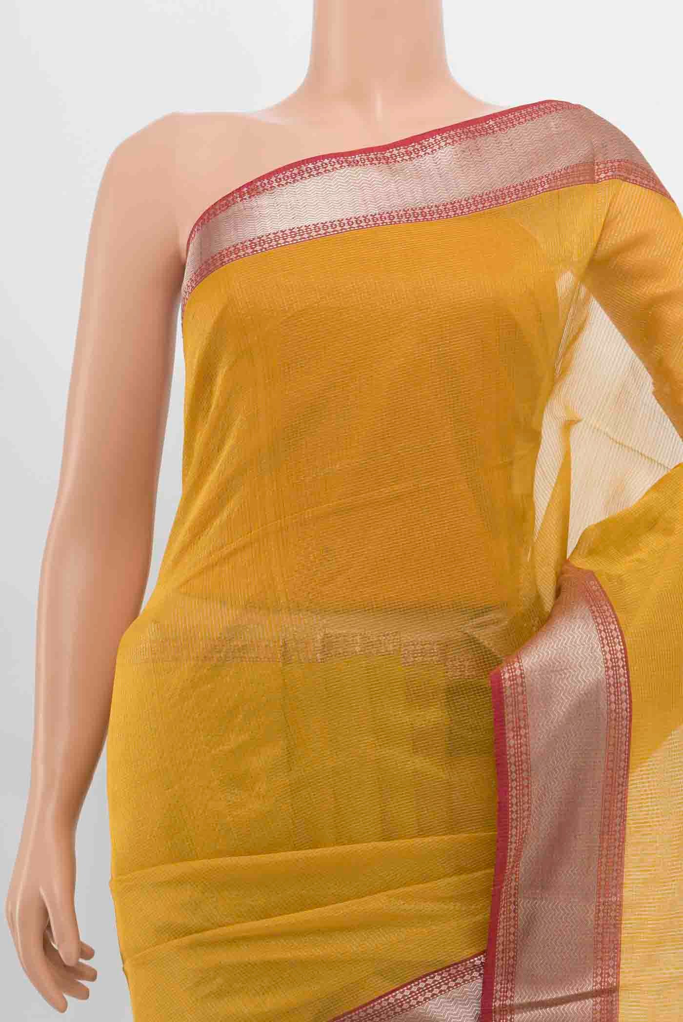 Border image of Mustard Maheshwari Silk Cotton Saree with Zari Butta on the body and Silk Border. 