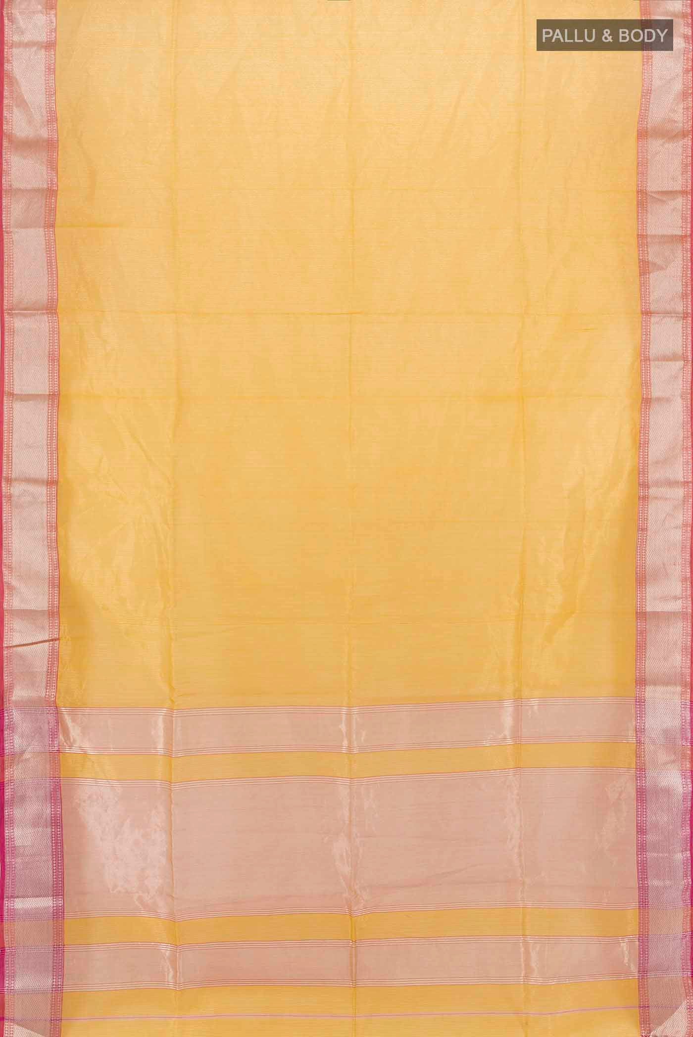 Flat view of Mustard Maheshwari Silk Cotton Saree with Zari Butta on the body and Silk Border. 