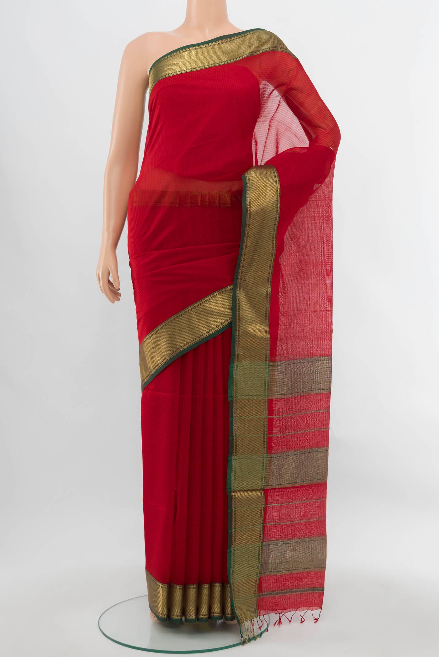 Red Maheshwari Silk Cotton Saree with Plain Body and Silk Border.  displayed on a mannequin