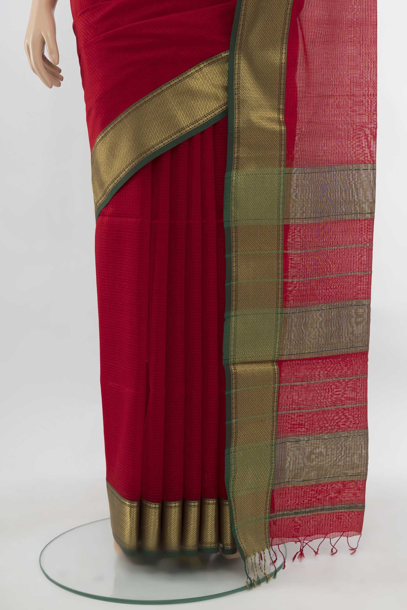 Pleats and pallu of Red Maheshwari Silk Cotton Saree with Plain Body and Silk Border. 