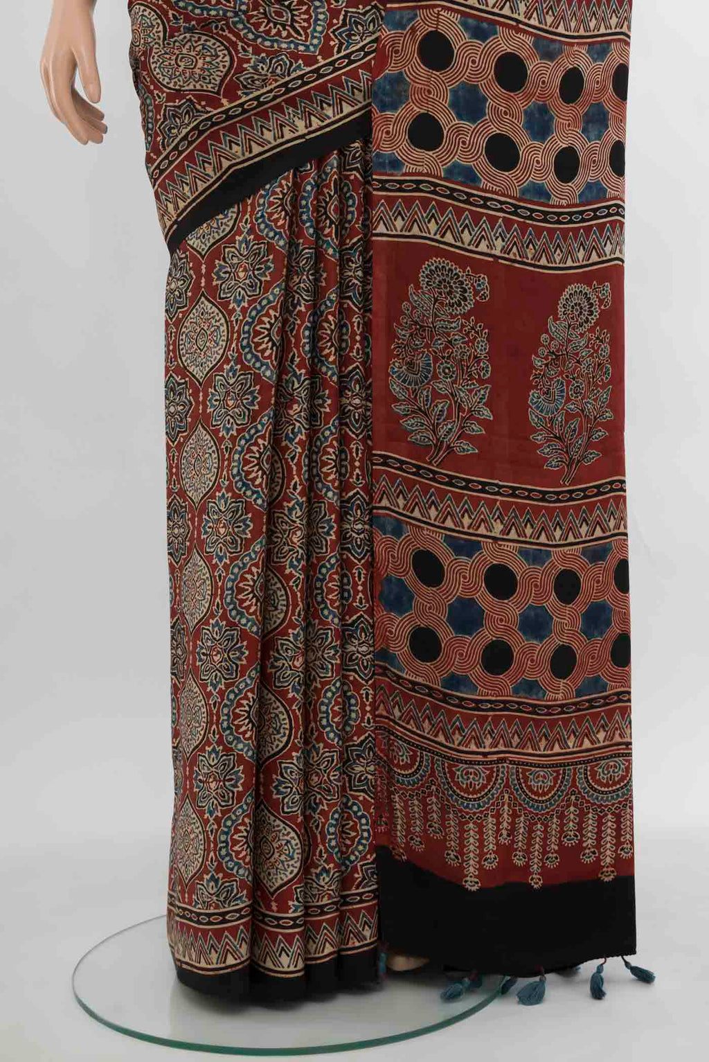 Pleats and pallu of Multi Color Muslin Silk Saree with Floral Print on the body and Silk Border. 