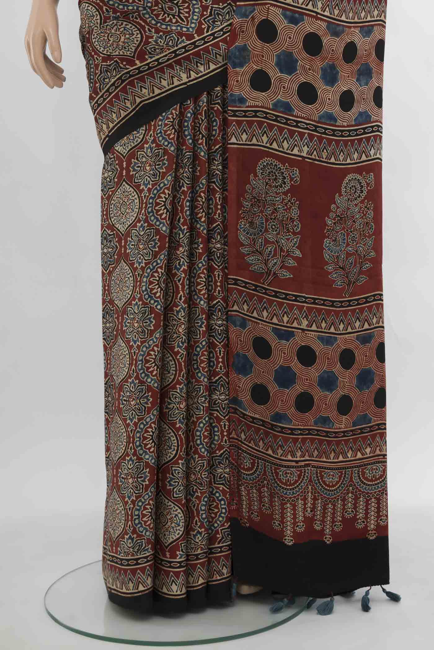 Pleats and pallu of Multi Color Muslin Silk Saree with Floral Print on the body and Silk Border. 