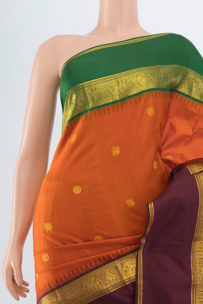 Border image of Pure Silk Pure Zari Rust Kanjivaram Saree with Zari Butta on the body and Silk Border. 