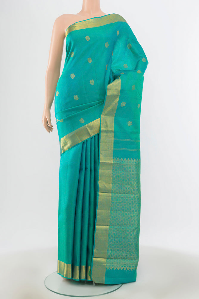 Sky Blue Kanjivaram Silk Saree with Zari Brocade on the body and Silk Border.  displayed on a mannequin