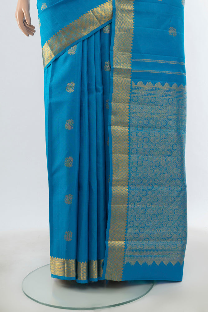 Pleats and pallu of Pure Silk Pure Zari Light Blue Kanjivaram Saree with Zari Butta on the body and Silk Border. 