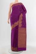 Pure Silk Pure Zari Violet Kanjivaram Saree with Zari Butta on the body and Silk Border.  displayed on a mannequin