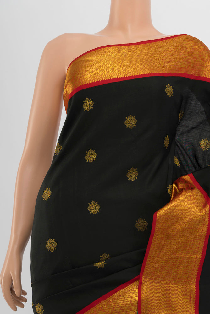 Border image of Black Kanjivaram Silk Saree with Zari Butta on the body and Silk Border. 