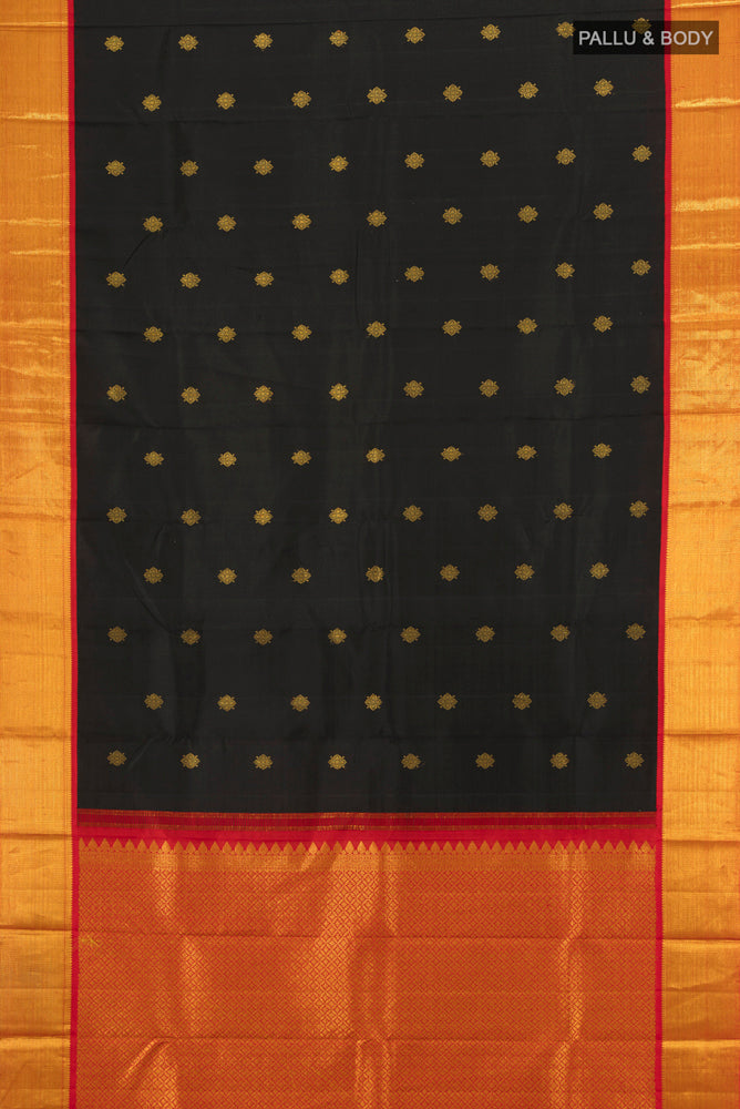 Flat view of Black Kanjivaram Silk Saree with Zari Butta on the body and Silk Border. 