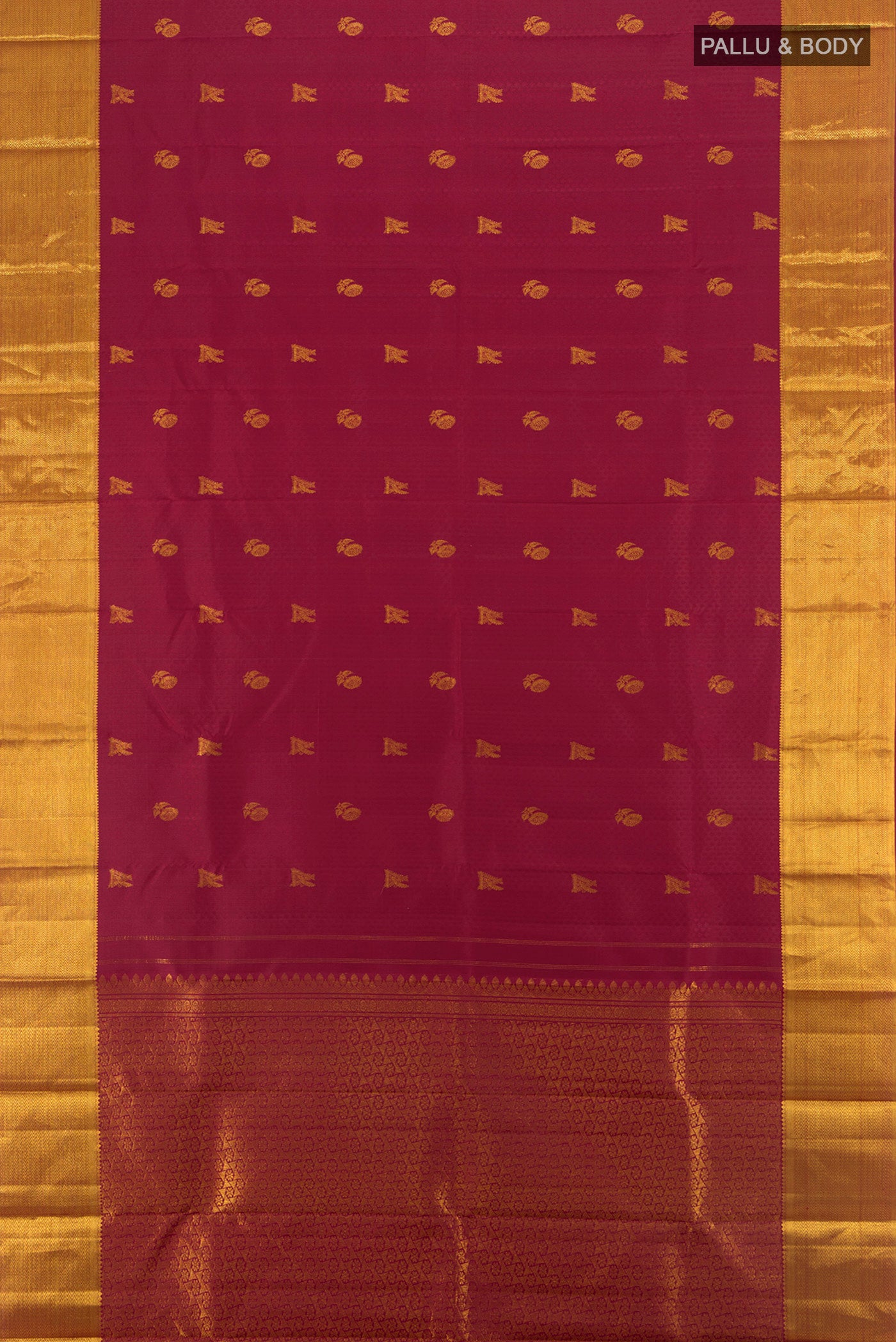 Flat view of Maroon Kanjivaram Silk Saree with Zari Butta on the body and Zari Border. 