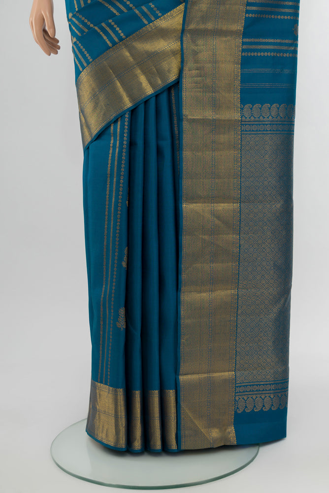 Pleats and pallu of Dark Blue Kanjivaram Silk Saree with Zari Butta on the body and Silk Border. 