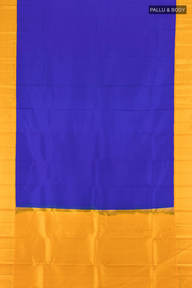 Flat view of Pure Silk Pure Zari Light Blue Kanchipuram Saree with Zari Butta on the body and Silk Border. 