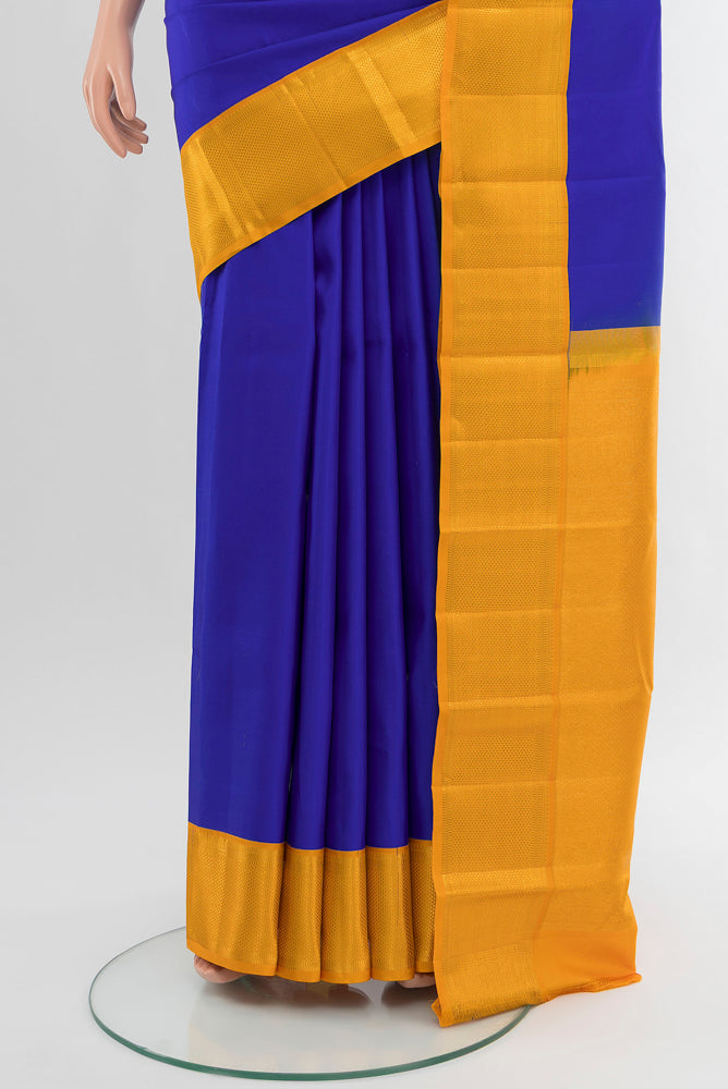Pleats and pallu of Pure Silk Pure Zari Light Blue Kanchipuram Saree with Zari Butta on the body and Silk Border. 