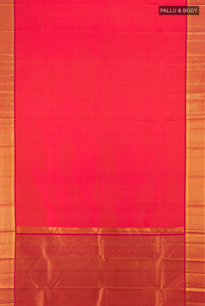 Flat view of Peach Kanchipuram Silk Saree with Zari Brocade on the body and Silk Border. 