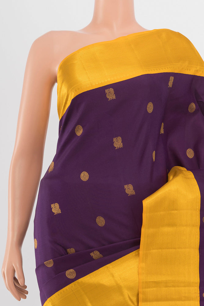 Border image of Purple Kanchipuram Silk Saree with Zari Butta on the body and Silk Border. 