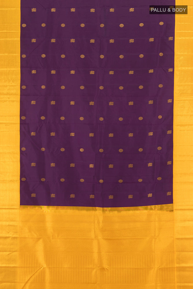 Flat view of Purple Kanchipuram Silk Saree with Zari Butta on the body and Silk Border. 