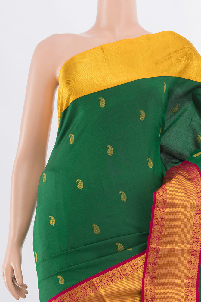 Border image of Bottle Green Kanchipuram Silk Saree with Zari Butta on the body and Silk Border. 