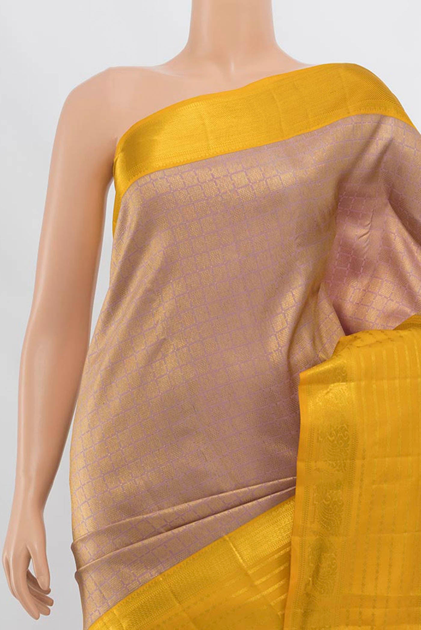 Border image of Golden Kanjivaram Silk Saree with Zari Butta on the body and Silk Border. 