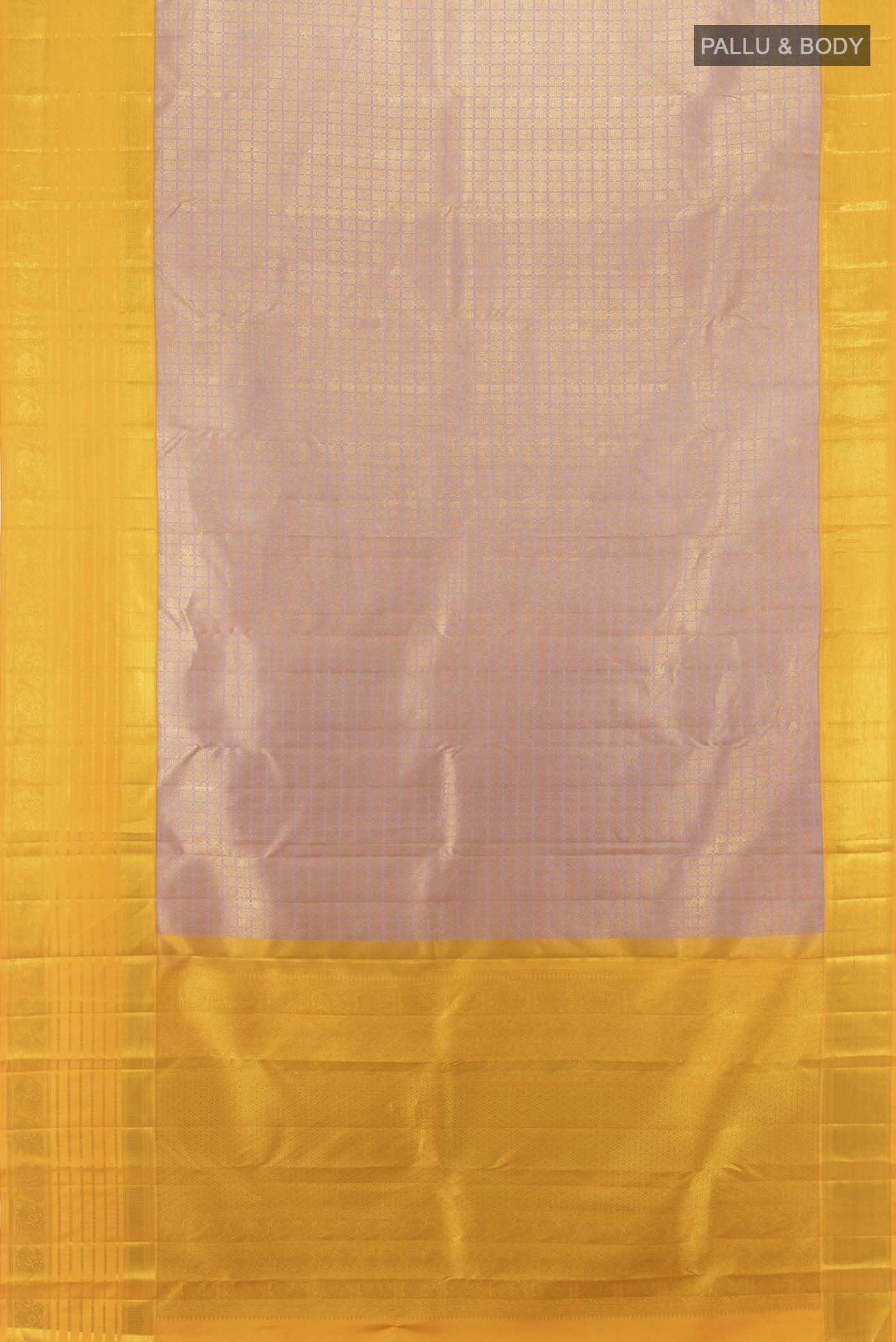 Flat view of Golden Kanjivaram Silk Saree with Zari Butta on the body and Silk Border. 