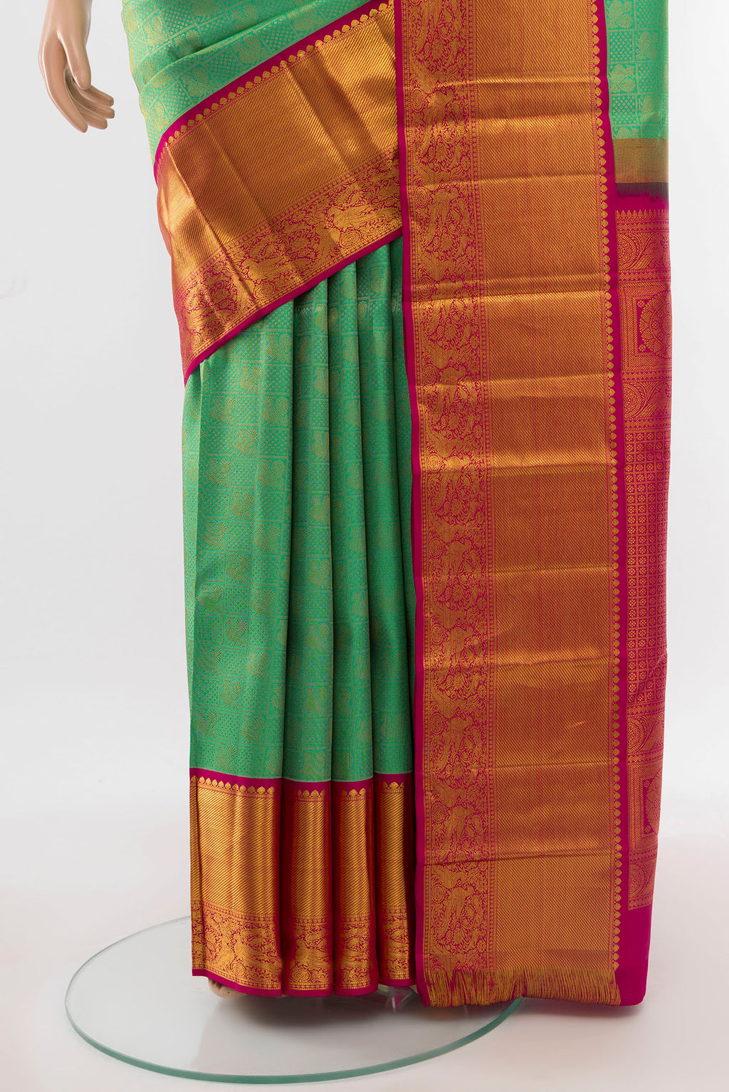 Pleats and pallu of Pure Silk Pure Zari Light Green Kanjivaram Saree with Zari Butta on the body and Silk Border. 