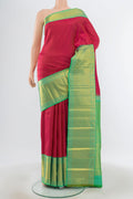 Dark Pink Kanjivaram Silk Saree with Plain Body and Silk Border.  displayed on a mannequin