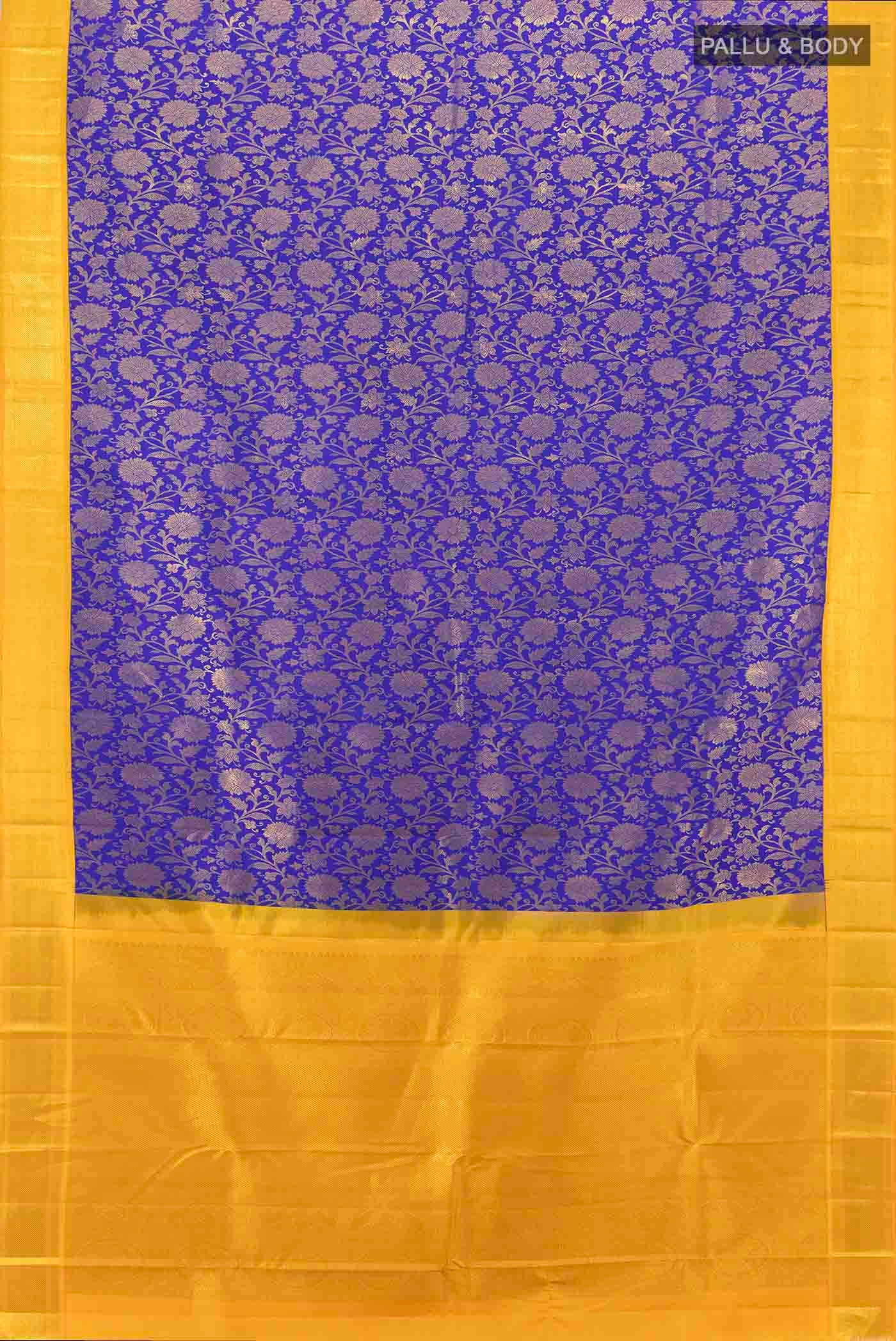 Flat view of Dark Blue Kanjivaram Silk Saree with Zari Butta on the body and Silk Border. 