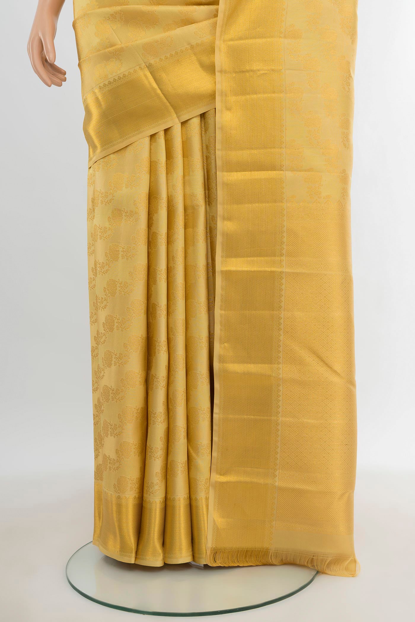 Pleats and pallu of Sandal Kanjivaram Silk Saree with Zari Brocade on the body and Zari Border. 