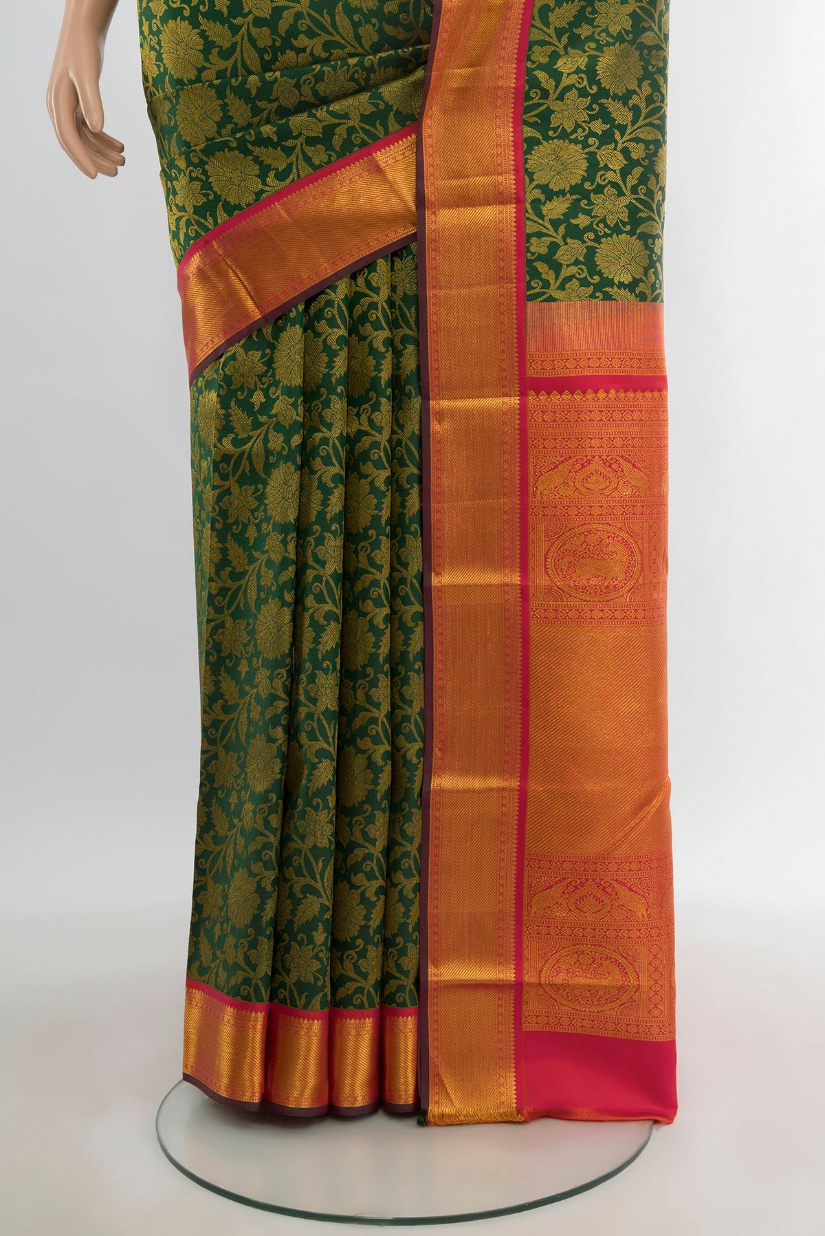 Pleats and pallu of Bottle Green Kanjivaram Silk Saree with Zari Brocade on the body and Zari Border. 